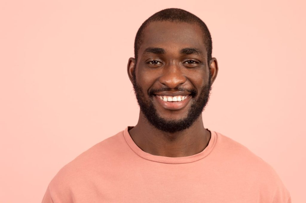 Man Smiling After Tooth Removal In Richmond, MI