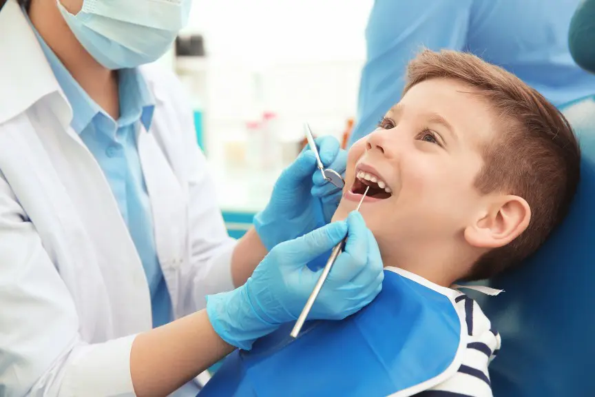 Child At Dentist For Tooth Extraction