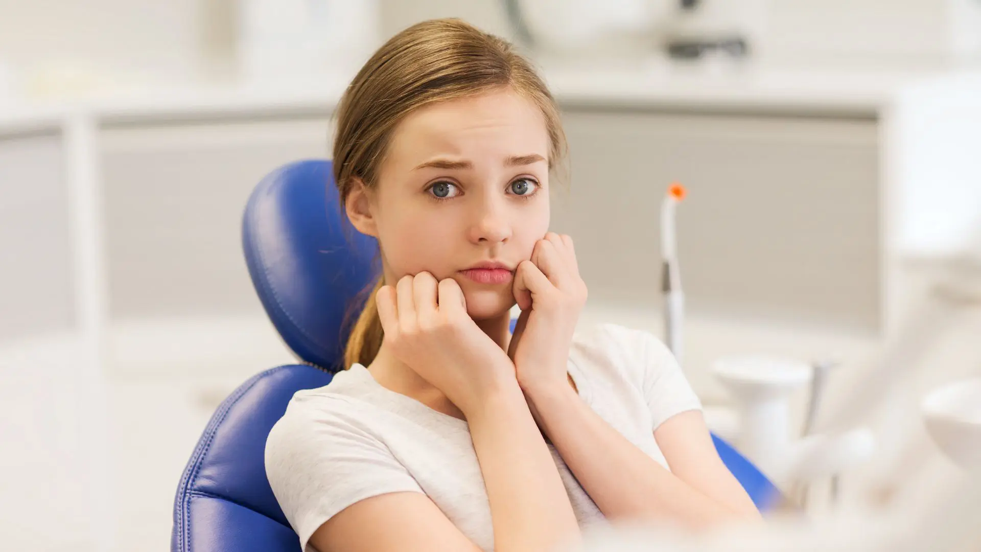 Anxious Girl In A Dental Chair